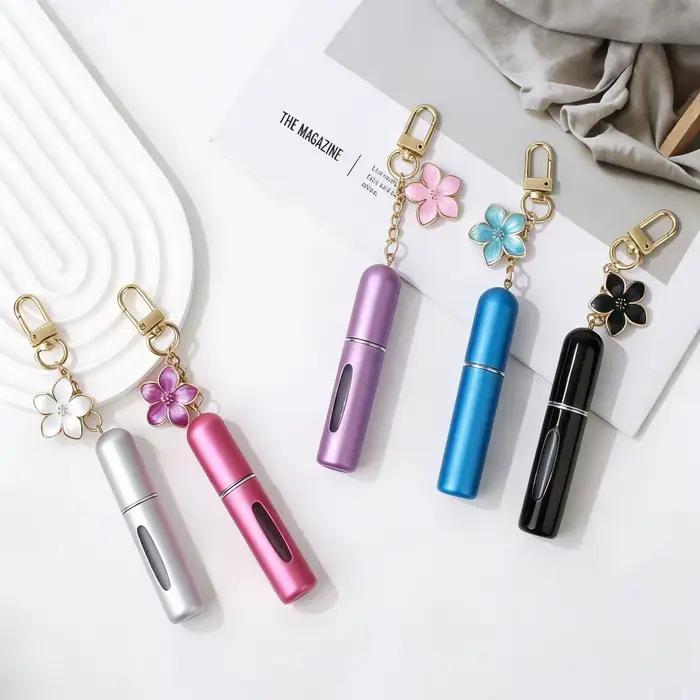 Nouveau et populaire Mini vaporisateur de parfum porte-clés 5 ml, rechargeable par le bas, portable, pour brume fine, conteneur de voyage vide